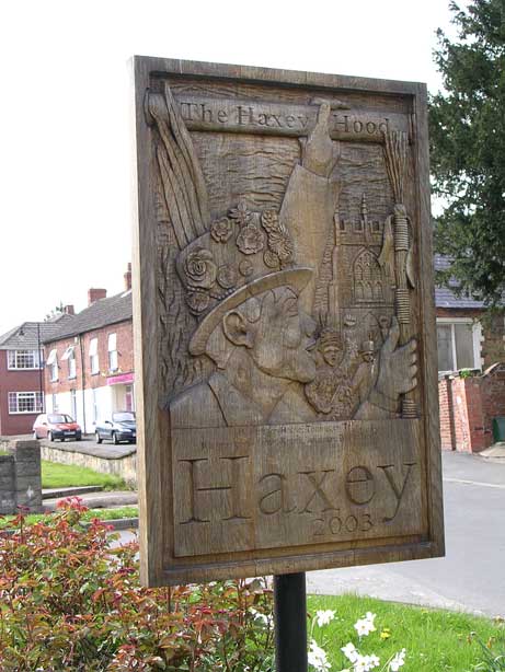 Carved wooden Haxey Hood sign